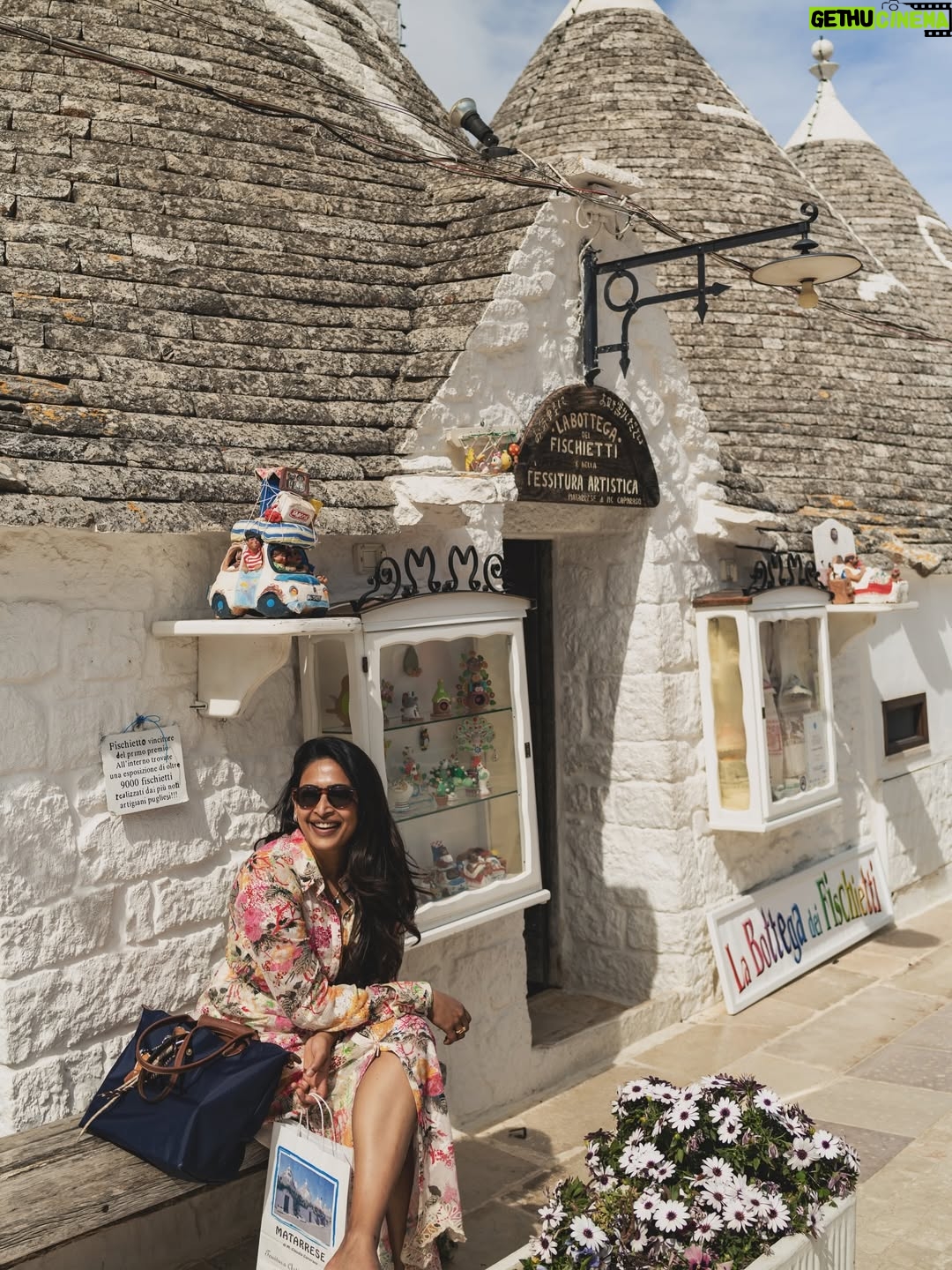Rebecca Roy - 113K Likes - 📍Alberobello in one magical morning!
This UNESCO World Heritage town in Puglia is famous for its Trulli — cone-roofed houses built entirely without mortar. These stone homes date back to the 14th century and were once designed to be easily dismantled to avoid taxes!
In just a few hours, we:
• Wandered through quiet Trulli lanes under the morning moon
• Learned about their fascinating architecture and history
• Explored charming local shops inside the Trulli
• Tried local wines, fig jams & olive oil
• Soaked in that golden morning light that made the whole town glow
Tip: We stayed in an actual Trulli at @tipicoresortalbergo — and highly recommend spending a night (or two!) here instead of doing a day trip.
Waking up early and catching the peaceful streets before the crowds arrive? 100% worth it.
Travel by @gtholidays.in
All content is self shot
#Alberobello #TrulliExperience #PugliaTravel #UNESCOWorldHeritage #coupletravel #ItalyHiddenGems #TipicoResort #TrulliStay #SlowTravelEurope #AlberobelloTips #chennaiinfluencer