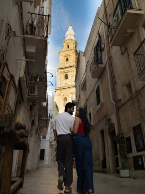 Rebecca Roy Instagram - 📍Monopoli, Puglia
our favourite coastal gem in Italy you’ve probably never heard of (but should definitely visit!)
Here’s what we loved and what you can’t miss:

	1.	Wander the old town – cobbled alleys, baroque churches, and pastel buildings that look straight out of a painting.
	2.	Visit the Cathedral of Maria Santissima della Madia – both the façade and the interiors left us speechless.
	3.	Catch golden hour by the port – the blue fishing boats and warm light? Pure magic.
	4.	Snack on fresh seafood from a street-side kiosk – crispy, salty, and unforgettable.
	5.	Stop by Salumeria Gustavo – a cozy spot where we had some of the best cured meats and local snacks.
	6.	If you’re lucky, stumble into a street performance or local parade – we did, and it was pure joy!

Monopoli may not be on every tourist’s radar, but that’s what makes it even more special.
Just the two of us, the sea breeze, and a town that made us fall in love all over again! 
Share it your apulian travel partner! 

Travel by @gtholidays.in 

#chennaiinfluencer #italytravel #monopoli #coupletravel #italysummer #coupleinfluencer #indianblogger #italytrip #travelbloggers #puglia #puglialovers