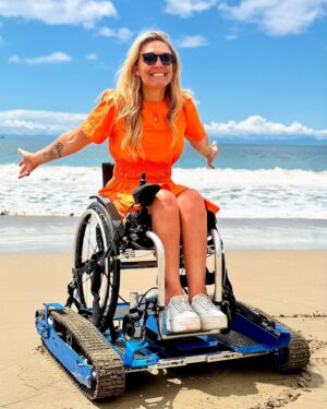 Sophie Morgan Instagram - This is FREEDOM! 

This week, as part of a film I hosted for @visitcalifornia, I was introduced to this extraordinary invention: FreedomTrax (@freedomtrax)

Please have a scroll through these images and videos. 

The FreedomTrax is a manual wheelchair accessory designed to enhance outdoor access accessibility. It’s a battery operated device controlled by a joystick, enabling manual wheelchairs to navigate sand, hiking trails… And even snow!

Thanks to everyone involved in making this happen. This was my FIRST EVER time on a California beach. It was incredibly emotional. 

In Nature Track’s words “we are in the business of making people happy”. Honestly, I can attest, they REALLY are. 

If you want to know more about them please contact Sue (last slide) at @naturetrack_ (if you are in the USA) .They are based in Santa Barbara (but @freedomtrax have a global presence) and best of @naturetrack_ loan them to users ….for FREE. 

Sue@naturetrack.org
Abby@naturetrack.org 

If you want to buy one they cost $6.5k but you can RENT them from @naturetrack_ for nothing. It is available to anyone who uses a wheelchair or requires assistance accessing outdoor spaces. If you don’t have a manual wheelchair NatureTrack can lend you one (I assume, USA only - please contact them to find out). 

#NatureTracks #FreedomTracks #Wheelchair #Beach #Wheelchair #AdaptiveEquipment #BeachLife #California #AdaptiveFreedom 

THIS IS NOT AN AD. I AM NOT PAID FOR THIS POST. I AM NOT AFFILIATED TO THIS PRODUCT OR COMPANY.