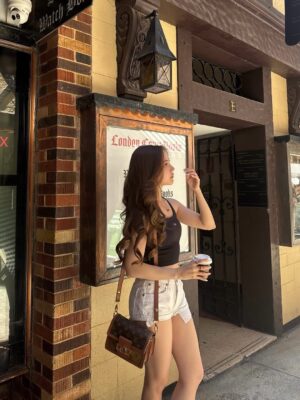 Agatha Chelsea Instagram - who drinks hot coffee under a blazing summer sun? me