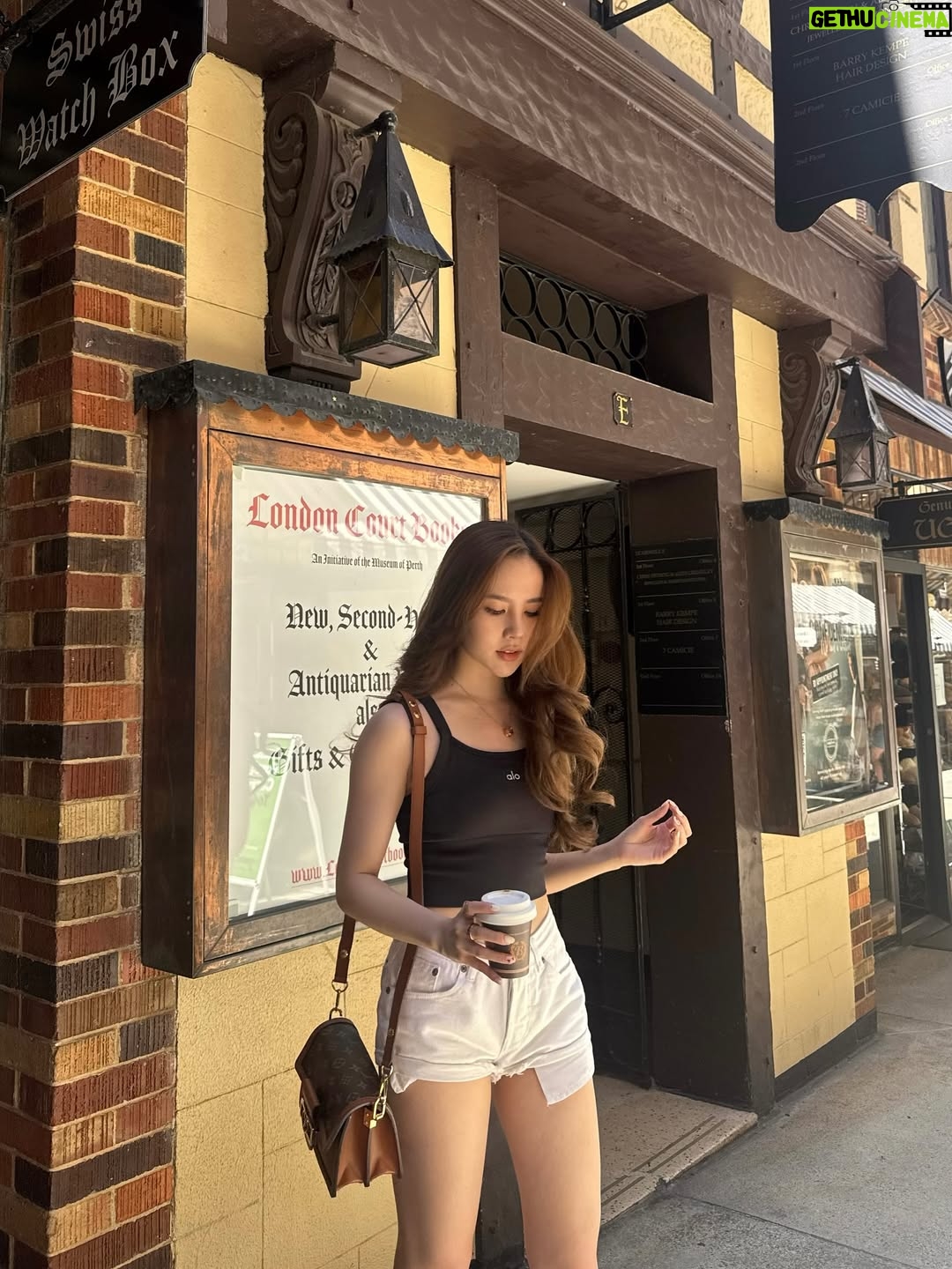 Agatha Chelsea - 326.7K Likes - who drinks hot coffee under a blazing summer sun? me