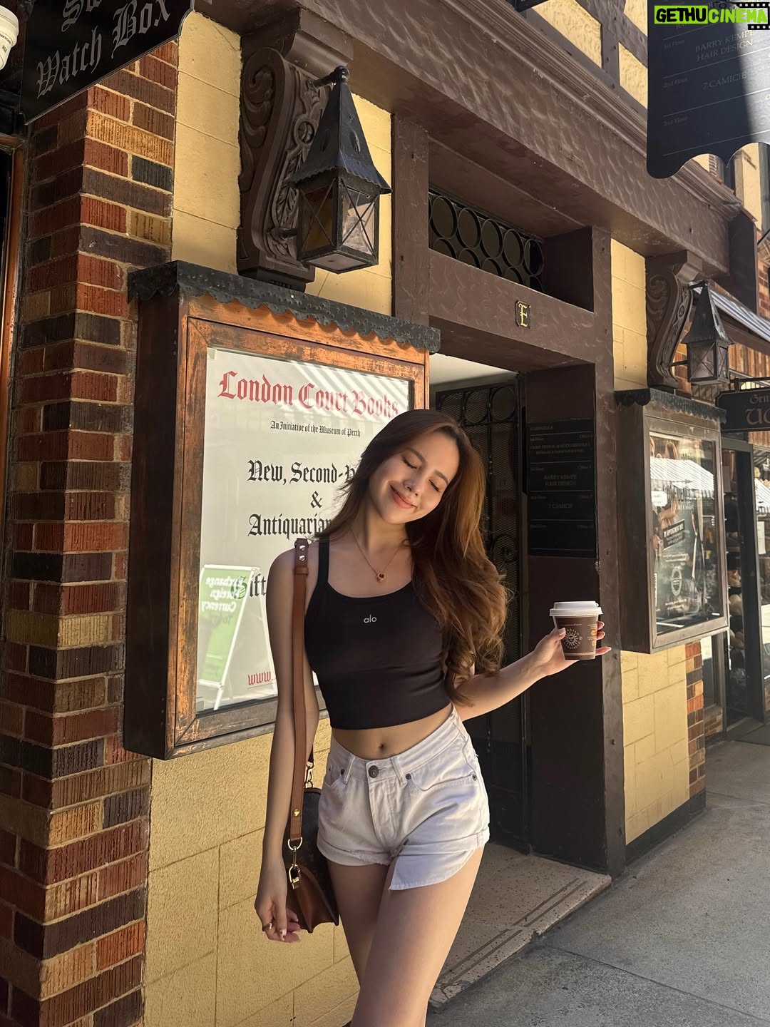 Agatha Chelsea - 326.7K Likes - who drinks hot coffee under a blazing summer sun? me
