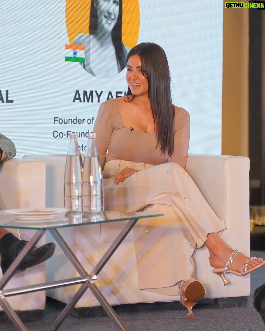 Amy - 33.1K Likes - My week has been a whirlwind ! 

Pic 1: Speaking at @veganindiaconference 
Pic 2: Coffee at @pause.mumbai ! And if you haven’t tried the monsoon menu, you must!! 
Pic 3: On stage at @veganindiaconference 
Pic 4: Unsure if I should keep the fringe
Pic 5: @ribbhu.mehra_djribz 🧿 
Pic 6: Celebrating my loves 
Pic 7: Ragi pancakes at @pause.mumbai 
Pic 8: Working off the pancakes 
Pic 9: Cats and dogs do get along!