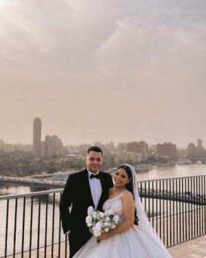 Badria Tolba Instagram - Beautiful day ahead!🤍
Congratulations to our beautiful couple 🕊️
Salma & Mohamed 😍
Full coverage on our #highlights Story ✨
—————————————————
Media Coverage: @tajweddings.eg
Wedding planner: @ahmedyassinweddingplanner
Photographer: @bassam_esa__photography
Videographer: @4kmediaservices
Makeup: @zeinaelnaggar
Hair: @shadilahoud
Dress: @mohamedismaelcouture
Cakes: @cake_up_egypt
Room Decoration: @ballonella9
Robes: @qamaragency.eg
Bouquet: @ayakhamis_bridal_bouquet
Dj: @dj.amedeo
Fire: @ahmedessamfire
Hotel: @thenileritzcarlton
—————————————————