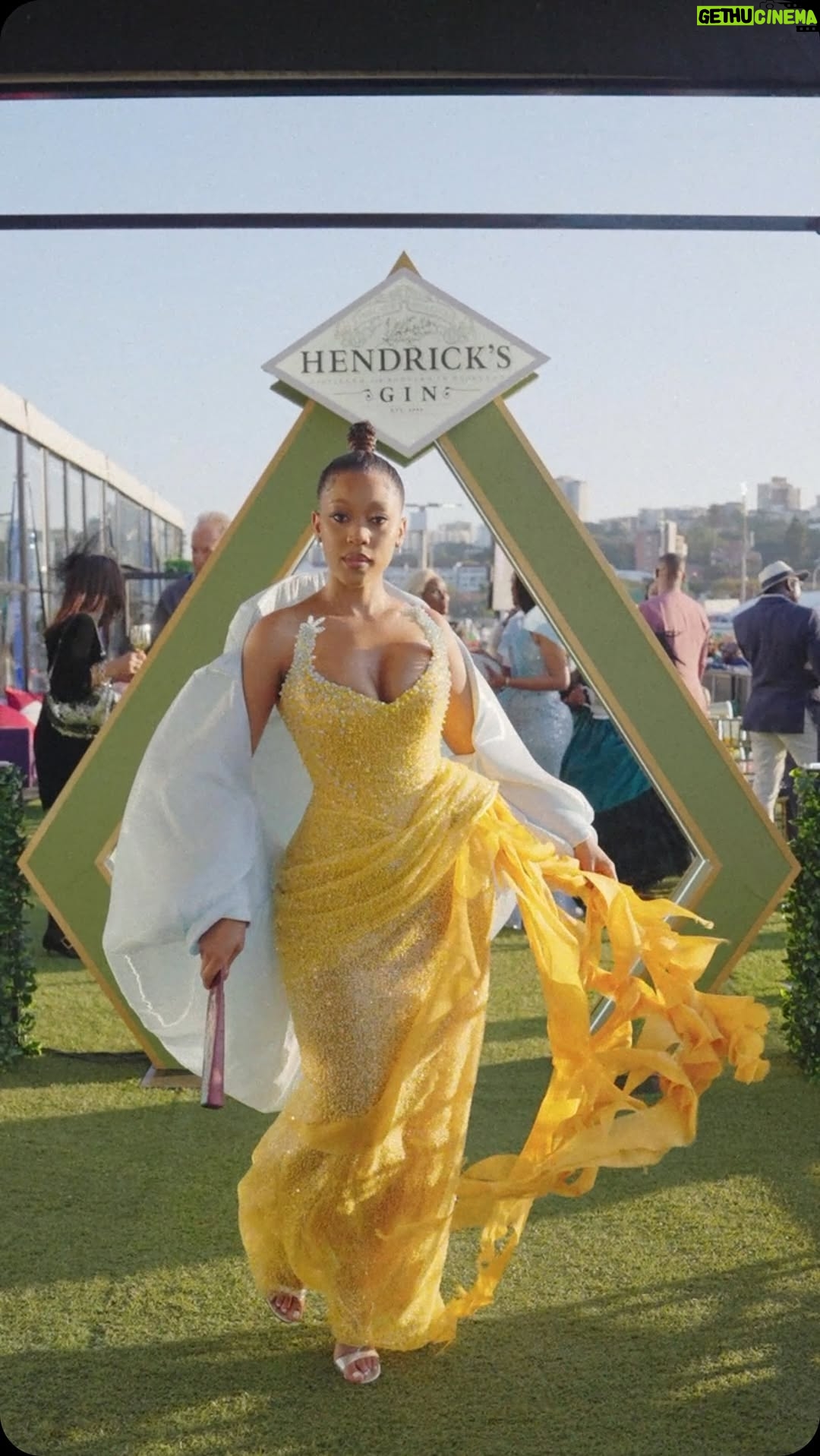 Buhle Samuels - 47.6K Likes - Can’t wait to update White Fang! 
Reeling it in with @hendricksgin at @chaise_lounge.
#BeyondGin 

We had a time at the Durban July 💫

Dress: @willetdesignscouture