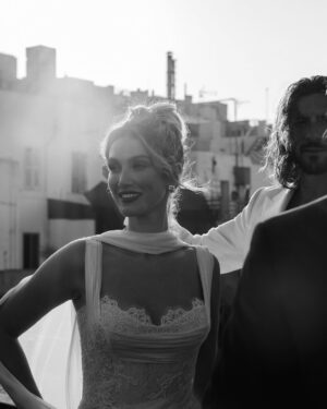 Delta Goodrem Instagram - EXCLUSIVE: Delta Goodrem’s wedding celebrations began with a breathtaking welcome dinner at The Sheer Bastion @cugo_gran_macina in Malta - and we have the first look. From the moment guests arrived to the sound of Frank Sinatra and Nat King Cole, it was clear this wasn’t just any wedding week. It was going to be unforgettable.
Dressed in a custom @antoinettefusillo gown - a soft blush lace creation that “felt like it was dancing with me through the night,” Delta set the tone for a week of love, joy and full dance floors. Paired with pale pink @lanawilkinsonofficial heels, @antonjewellery diamonds and a deep plum lip by makeup artist @nonismithmakeup, the look was pure modern romance. Styled by @meggysmithstylist every detail was effortless elegance.
Guests were treated to flowing champagne, fresh canapés and a live performance from Maltese artist Kevin Paul. “Everyone was dancing and singing up a storm,” Delta tells us. “It was the perfect first chapter.”
Captured by @mattporteous and @becky_lee_brun, with planning by @sarahyoungevents and @thisiswonderevents, these moments were pure magic. Head to the link in bio for every exclusive detail.