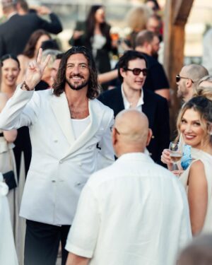 Delta Goodrem Instagram - EXCLUSIVE: Delta Goodrem’s wedding celebrations began with a breathtaking welcome dinner at The Sheer Bastion @cugo_gran_macina in Malta - and we have the first look. From the moment guests arrived to the sound of Frank Sinatra and Nat King Cole, it was clear this wasn’t just any wedding week. It was going to be unforgettable.
Dressed in a custom @antoinettefusillo gown - a soft blush lace creation that “felt like it was dancing with me through the night,” Delta set the tone for a week of love, joy and full dance floors. Paired with pale pink @lanawilkinsonofficial heels, @antonjewellery diamonds and a deep plum lip by makeup artist @nonismithmakeup, the look was pure modern romance. Styled by @meggysmithstylist every detail was effortless elegance.
Guests were treated to flowing champagne, fresh canapés and a live performance from Maltese artist Kevin Paul. “Everyone was dancing and singing up a storm,” Delta tells us. “It was the perfect first chapter.”
Captured by @mattporteous and @becky_lee_brun, with planning by @sarahyoungevents and @thisiswonderevents, these moments were pure magic. Head to the link in bio for every exclusive detail.