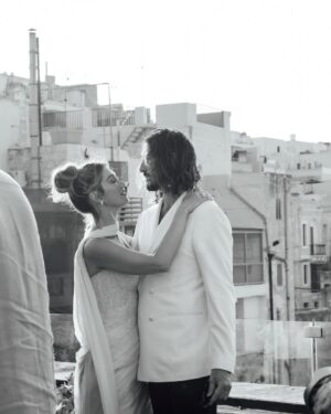 Delta Goodrem Instagram - EXCLUSIVE: Delta Goodrem’s wedding celebrations began with a breathtaking welcome dinner at The Sheer Bastion @cugo_gran_macina in Malta - and we have the first look. From the moment guests arrived to the sound of Frank Sinatra and Nat King Cole, it was clear this wasn’t just any wedding week. It was going to be unforgettable.
Dressed in a custom @antoinettefusillo gown - a soft blush lace creation that “felt like it was dancing with me through the night,” Delta set the tone for a week of love, joy and full dance floors. Paired with pale pink @lanawilkinsonofficial heels, @antonjewellery diamonds and a deep plum lip by makeup artist @nonismithmakeup, the look was pure modern romance. Styled by @meggysmithstylist every detail was effortless elegance.
Guests were treated to flowing champagne, fresh canapés and a live performance from Maltese artist Kevin Paul. “Everyone was dancing and singing up a storm,” Delta tells us. “It was the perfect first chapter.”
Captured by @mattporteous and @becky_lee_brun, with planning by @sarahyoungevents and @thisiswonderevents, these moments were pure magic. Head to the link in bio for every exclusive detail.