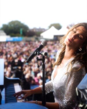 Delta Goodrem Instagram - Catching up!!! ✈️🚗⛴️🌎 Lytham last week was ALL sparkles and loud singing. And ridiculous wind but we got through! loved seeing you all there for the first time and excited be back your side in September in Preston! xxx
Outfit @_zhivago_