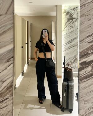 Diksha Bhatia Instagram - Boarding my dreams✈️✨

📍: @changiairport 

[ singapore airport , airport ootd , all black fit inspo , vacation , travel look ] 

#explore #airportlook #travel #ootd #singaporeairport #changiairport #fypシ
