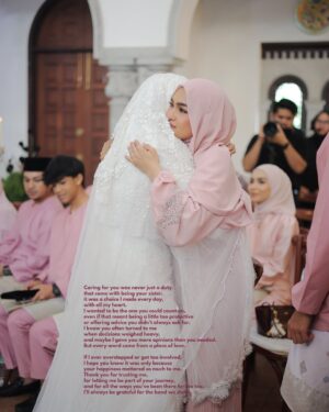 Elfira Loy Instagram - Still battling jet lag and migraine episodes since the flight to Spain, but I had to put all that aside for my sister’s special day.
Running on just 1.5 hours of sleep, and lots of “Kakak, rasa yang ni kot,” “Kakcik kena macam ni,” “Yang ni dah ke, yang tu?” and of course, “Tulah taknak dengar cakap kakak!” hehe
Finally, yesterday was the day. #LisafoundherHafiz
Thank you so much to everyone who came and shared in our joy. I hope you left with happy memories, and I humbly ask that you slip in a prayer or two for my sister’s new journey. If there was anything lacking, please forgive me 🙏🏻being tuan rumah is never easy, but every effort was made with love.
May the laughter and warmth from yesterday linger in our hearts, and may my sister’s days ahead be filled with blessings as beautiful as the love we all witnessed. Thank you for being part of our story. 🍒