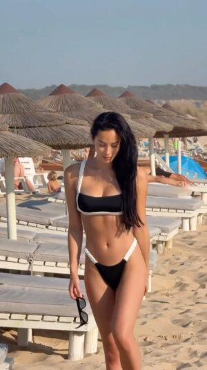 Franki Russell Instagram - happy place 🌊🤍 @FashionNova
🔎 Classic Touch Coloblock Ruched Straps 2 Piece Bikini - Black/White