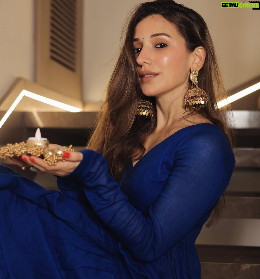 Heli Daruwala - 53.8K Likes - Forever finding reasons for “KAJU KATLI” (last slide)
Diwali Love and light 🪔🧿♥️🫠 #iykyk na fam…!! 
Wearing @mmitaaism
📸 @rutvang_viradiya 
Ps - also me waiting for the whole year to use this song😂