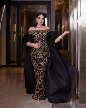 Hiba Al-Durri Instagram - اطلالتي الجميله في مهرجان الدانه😍
Stylist: @eliekhallil5
Dress: @labourjoisie
Bag: @scudo_bags
Makeup: @azharhubail
Hairstylist: @zainab.shamlooh
Photographer: @ahm.de17