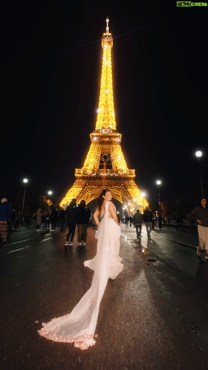 Himadri - 38.1K Likes - “Standing here in front of the Eiffel Tower, wearing my own creation in Paris, feels surreal. Behind this moment are years of sleepless nights, countless sacrifices, and endless self-doubt. From dreaming about fashion in a small room to wearing my custom design in one of the biggest fashion cities in the world, the journey has been anything but easy. Every challenge, every failure has only made me stronger, and today, I wear this outfit not just as a creator, but as a testament to the power of persistence and passion. 💫
 #DreamBig  #DRIbyHimadri #parisfrance 

Wearing : @dribyhimadri custom outfit
Shot by: @adityabhansali_ 
Hair by: @varvarad