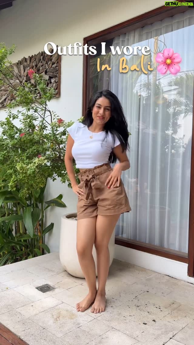 Ishika Bhargava - 17K Likes - Bali Core 🌺💛🌴
1st outfit ( brown shorts and white tee )  @azortestore 
2nd outfit ( yellow skirt and white top ) top - @meshki skirt @peppermayo 
3rd outfit ( tan cover up ) @nidzign 
4th outfit ( mint top and white skirt ) top @peppermayo skirt - forgot 🙈
5th outfit @ohpolly
