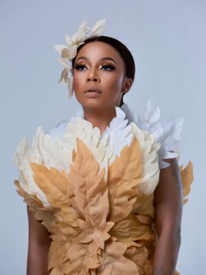 Kelly Khumalo Instagram - Not Every embrace is affection, some are assassination attempts…… As we bloom with a @tn_collectiv face by @makeupbyminkzz9 and captured by @fistoartist #NyamezelaOut #20yearsOfKellyKhumalo tickets available at computicket 👏🏽🐆🤴🏾🐉🧜🏾♀️🌍 #BloomingSeason