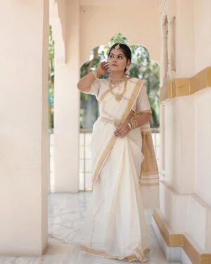 Khyati Sonigra Instagram - Titli ✨🦋
.
.
.
.
Makeup & hair @riya.s___makeover 
Shoot by - @godfather_bridalshoot 
.
.
.
#southindian #look #bride #song #instagram #instagood #instafam #famlove