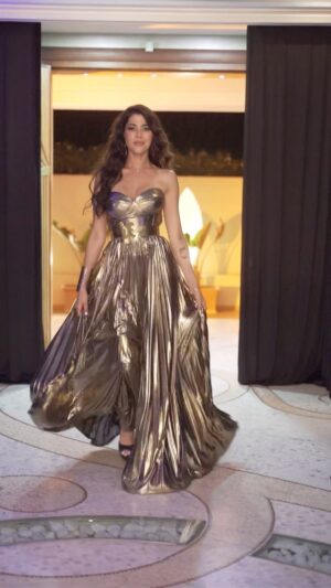 Maram Ben Aziza Instagram - Golden goddess in #souhirelgabsi ✨
Creation @cannes_filmfestival  2022
Video : @med.keemla.cinematographer @hammadibelhadj1 

#souhirelgabsi #couture #glitters  #handmade #swarovski #redcarpet #celebrity #dubai #cannes #luxury #wedding
