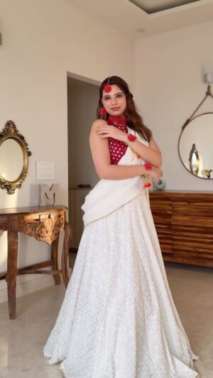 Mili Lakhmani Instagram - Celebrating Janmashtami with a dreamy touch! šøāØ
Part 2 of my look: pairing a beautiful white lehenga with a hint of jugaar and lots of love! š„°
The jewelry from InstaMartš tied the entire look together.ā¤ļø
This is just a look and my little tribute to the festive spirit! Hope you love it as much as I do! š
#JanmashtamiLook #FestiveStyle #LehengaLove #InstaMartJewels #DIYStyling #IndianFestiveFashion #MixAndMatch #SubtleElegance