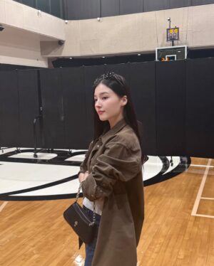 Nancy Jewel McDonie Instagram - my first basketball game🏀🧡