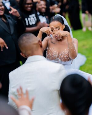 Ntando Duma Instagram - “When divine love descends, angels take form in the hearts of those who cherish forever”. My forever arrived in the most precious form - my husband, my best friend, my soulmate. We feel blessed to adorn the cover of @previdarweddings Magazine’s June 2025 issue, sharing our sacred celebration of God’s love with loved ones❤️
Heartfelt gratitude to the dream team who made our day unforgettable:
@Nono_Events - We wouldn’t have given this “tender” 😂 to anyone else but YOU! You brought our vision to life! You are a work of art. Thank YOU!!!🤍
@Geffphotography - You captured our love so beautifully & effortlessly. Thank YOU🤍
@_SunsetCocktails - That bar? As per our request? YOU ATE! Siyabonga 🤍
@Chefnzuzaofficial - oh my cake boss! You never disappoint! Our cake was a masterpiece, a symphony of taste and beauty. Thank YOU!🤍
@SuitabilityGardens - Your venue was a haven! You sure made our special day a memorable one. Siyabonga 🤍
@Suitability_ - Your tailored suits for MY husband and his men? Top tier! You elevated their elegance, a perfect blend of style and sophistication. Thank you!🤍
@Urbanhair_gallery - You just know how to make one feel like a queen. Thank you for my crown🤍✨
@Mianodesigns - My dress was a dream, a vision that exceeded expectations. Thank you 🤍
@Blackcrownza - That bar brought the perfect finish, sealing our celebration with flair. Our guests couldn’t be more pleased,Thank you!!🤍
Special thanks to those who added magic to our celebration:
@amandablacksa - Your gift and performance were everything and more. Thank you for blessing us🤍
@tondirams - Your one-of-a-kind performance stole our hearts. Precious moments indeed. Thanks bro🤍
@muneyi_ - Your angelic voice definitely touched our souls. We’re grateful. Ro livhuwesa🤍
To my incredible bridesmaids ( @iam_khanyi95 @simplymahadi @nadiajaftha - thank you for your love,contribution & support to my special day.I’m eternally thankful!🤍
@zanelepotelwa - your kindness, dedication, and willingness to be there for us on every special occasion haven’t gone unnoticed. Thank you for being a blessing to our family 🥹❤️#PrevidarWeddingMagazine #LoveStory #WeddingCelebration #NUbeginning