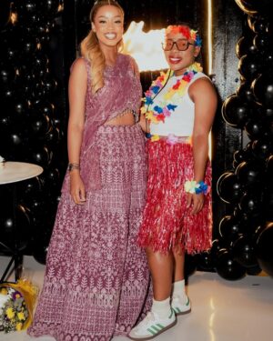 Ntando Duma Instagram - 29.08.24 - A grateful heart receives heavenly blessings. I’m super grateful for all my friends and loved ones who came to celebrate my CROWN birthday with me, you guys looked incredible, thank you for honoring the theme. As I step into twenty-fine, I’m holding on to the love, support and care that surrounds me, letting go of any doubts, uncertainty & fears with open arms and my infamous laugh 😂❤️ to many more themed parties and celebrations!🥂 Thank you Jesus!
Hair: @urbanhair_gallery
Make up : @maifa_madondo x @maifabeautcouture_
Outfit: @mianodesigns
Theme: “All around the world”
Decor: @nono_events
Cake: @chefnzuzaofficial
Photography: @bongani_rsa