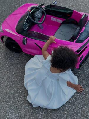 Omoni Oboli Instagram - Our hearts are overflowing with joy 🤩 
The Princess of the Oboli clan turned 1 😍
Happy birthday precious Naya 🎉💝
I prayed and longed for you and God brought you to us. The smartest, happiest and most beautiful baby girl ever 😍😍😍
I get to love you and it’s God’s best gift 💝 #HappyBirthdayNaya #Corvette #Baby
PS: Y’all’s niece is riding away in her hot pink corvette twinning with uncle 🔥 😂