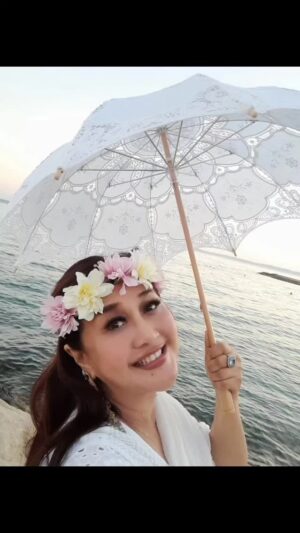Paramitha Rusady Instagram - When others try to rain your dreams
 carry an umbrella & dream on 
Let smile be your umbrella
 on a rainy or sunny day
 #paramitharusady