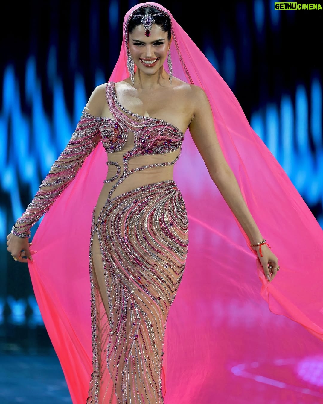 Rachel Gupta - 218.1K Likes - “The Blushing Lotus” is a stunning gown inspired by India’s national flower, embodying the grace and femininity of Indian women. Its soft pink hue symbolizes love and nurturing. Featuring a traditional head covering and maang tikka, this timeless @thuonggiakydesign piece beautifully merges cultural heritage with a modern pageant flair.

I was deeply honored last night to represent my country and am incredibly grateful for the overwhelming support from fans worldwide. Your love means everything to me.🩷

Hair: @yo_korawathairstylist @plugpro_hair89
Makeup: @nnadia.makeup
Gown: @thuonggiakydesign
Photo: @puikung 
Walk Trainer: @putrapassarela 

#MGI2024 #MGI #SpiritofThailand 
#GrandExperiences
#MissGrandInternational
#MissGrandInternational2024
#WeAreGRANDthe1andOnly

@nawat.tv
@teresa.mgi
@missgrandinternational 
@themgiofficial
@iamnikhilanand 
@iam_nishantanand 
@krish.gangwar 
@glamanandsupermodelindia 
@missgrandindiaofficial 
@gegee_mui456935
@miss.europeinthegrand @pageantempress @missgrandfamily @grandlism @malongdo_thailand @grand_mgi @puteri.pageant 

#missgrandindia #missgrandindia2024 #grandexperiences #mgio #Thailand #missgrandsoftpowerofthalland #missgrandthailand #มิสแกรนด์ซอฟต์พาวเวอร์ออฟไทยแลนด์ #เวทีอันดับ1ของประเทศไทย #มิสแกรนด์เวทีเพื่อประชาธิปไตย #นับจากนี้ทุกพื้นที่มีแต่แกรนด์