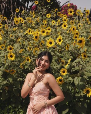 Ria Amin Instagram - Who needs ghibli filter when your pictures already look like this ? ☁️🌻🎐

Dress @leaclothingco
