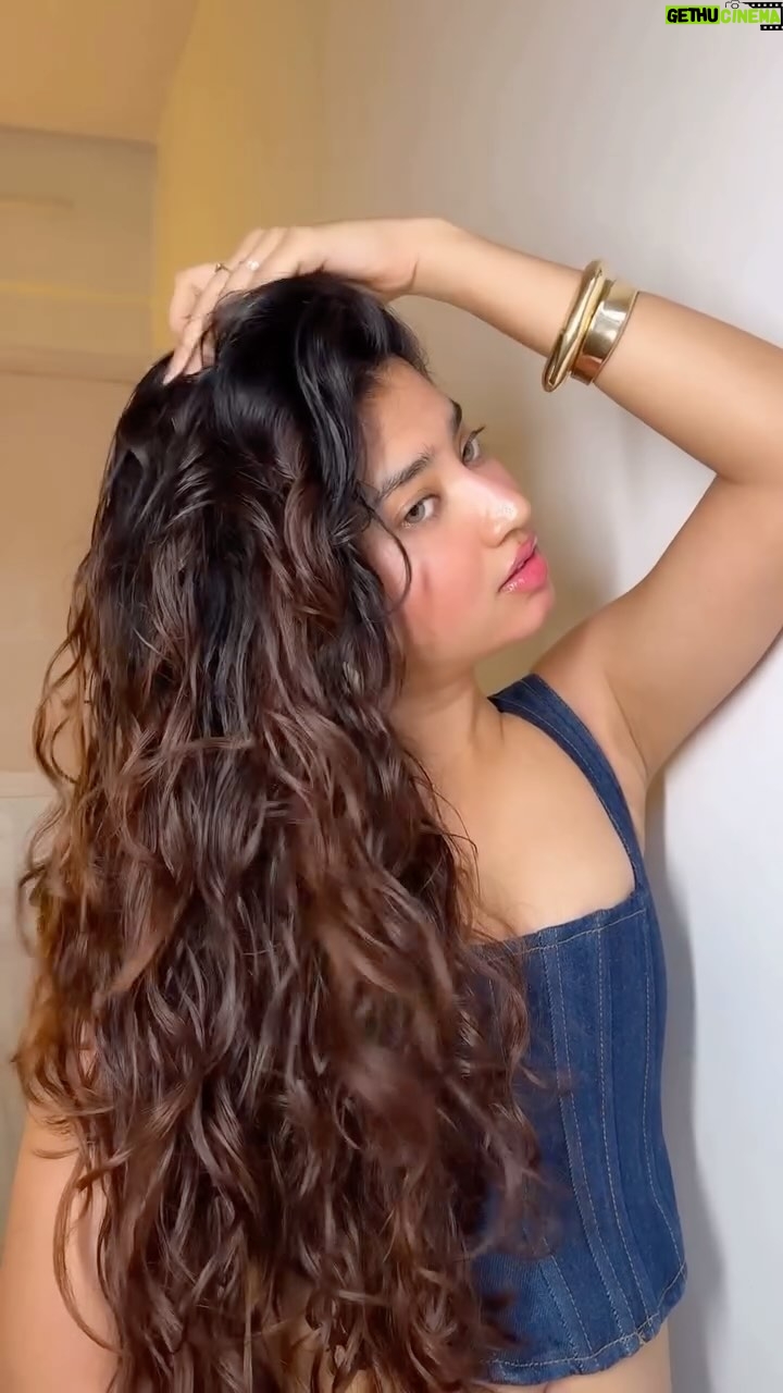Ria Amin - 423.9K Likes - It took me 24 years to realize I have wavy hair 😮‍💨

Initially, I wore a wig and that dramatic fire symbolized the years of damage I’ve caused to my real hair with excessive straightening. Please, don’t try this at home!

Products used :
1.) @letscurlupdotcom hair defining cream 
2.) @fiixmycurls glaze defining hair gel 

Comment for the products link