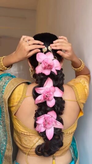 Ria Amin Instagram - Lotus Hairstyle 🪷

I know you guys are gonna comment about the saree I actually got it for my 12th farewell 😌

Also love @dotandkey.skincare barrier repair moisturizer 

Earrings from @ehsaasjewellery 

Comment for the moisturizer & extensions link 🩵