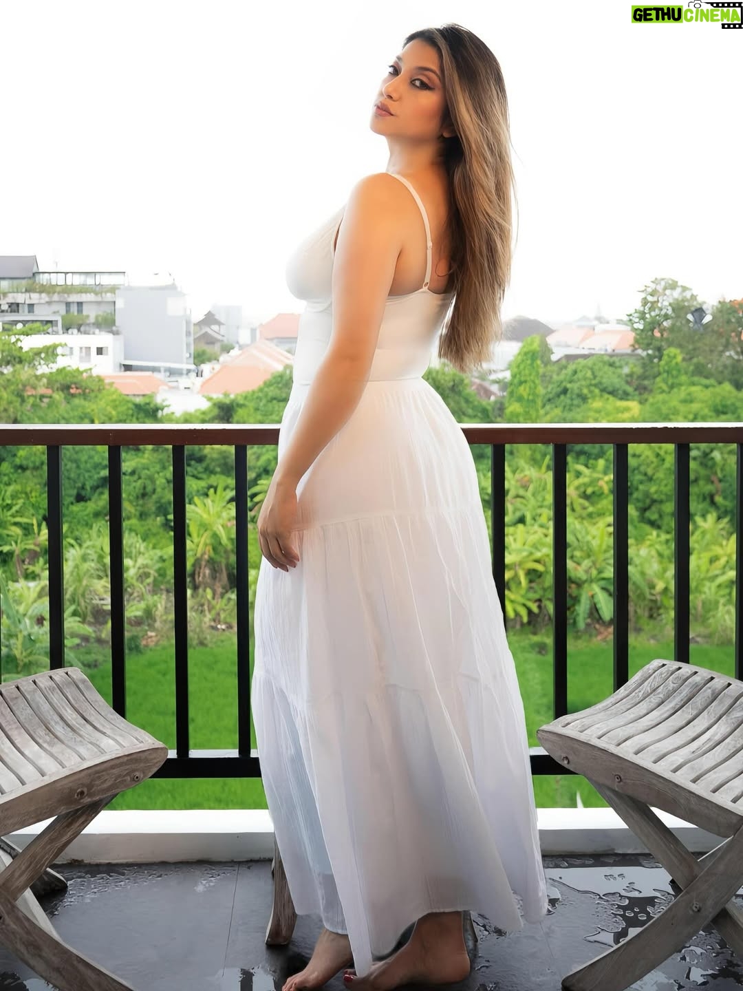 Sarah Azhari - 28.8K Likes - Rainy Bali vibes 🌧️ A photoshoot that makes it even more unforgettable. 🪬🧿
Photo @leandro_j_s