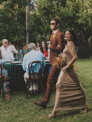 Sarah Hyland Instagram - 3rd anniversary in a row not being spent together, but jokes on you @wellsadams , youāre stuck with me. For life. Even when I involuntarily walk like this at weddings⦠Like⦠you have to pay lawyers to leave me š Happy anniversary loml. Iām so lucky to call you my husband and I love you to Pluto & Back Xx