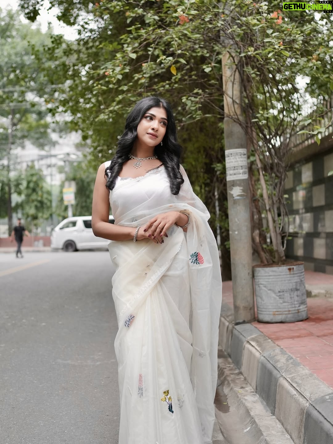 Sarika Sabah - 3.7K Likes - Wrapped in white, dreaming in color 🕊️🌸

Makeover: @evesalonbd 
Attire : @houseoftashaa 
Jewellery: @6yardsstory