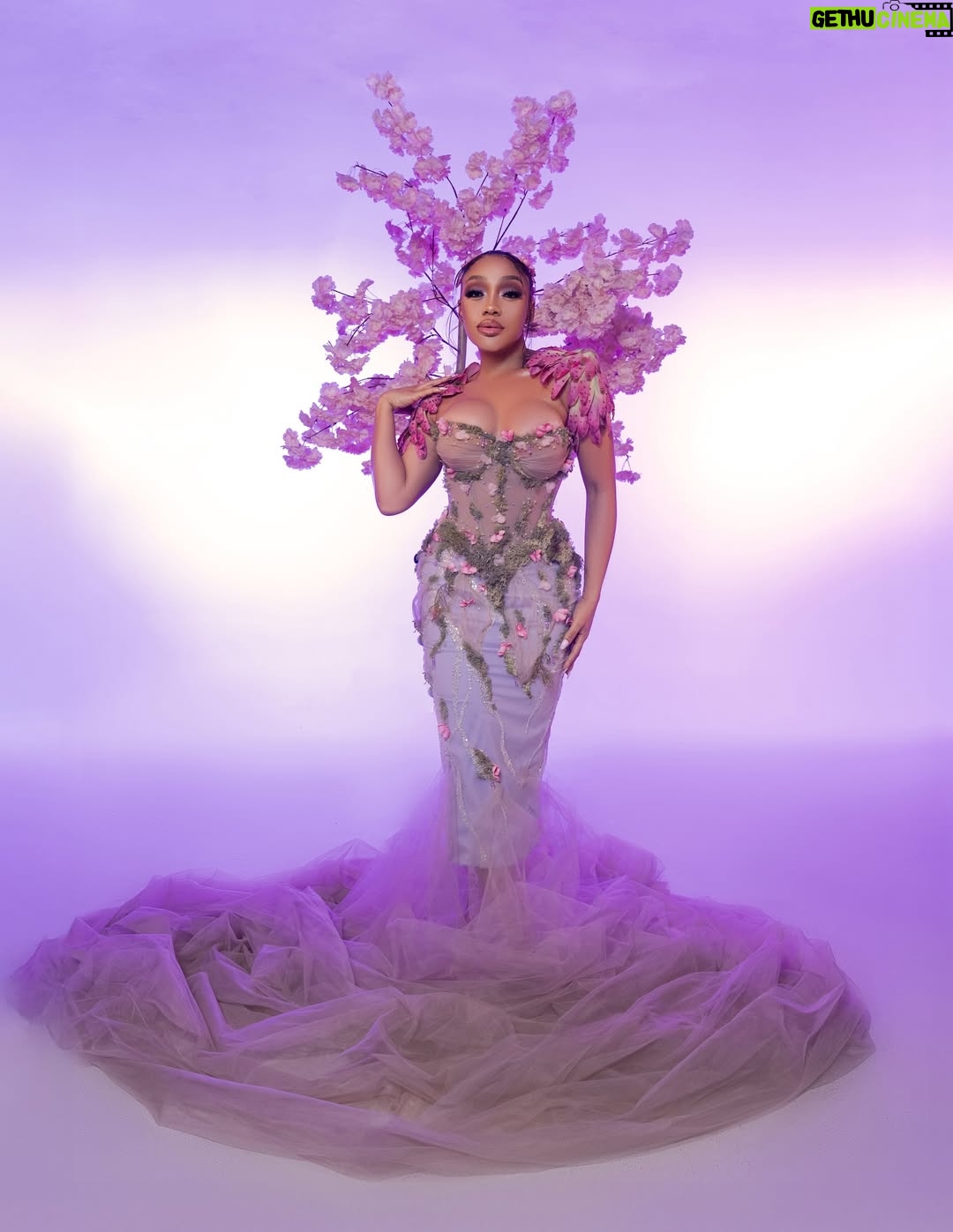 Thando Thabethe - 105.9K Likes - A love letter to South Africa’s soul — where valleys cradle winding rivers, mountains rise in quiet majesty, and the sky bursts into purple and orange at sunset. Inspired by the rich textures of indigenous flora and the rhythm of the land itself, every detail reflects the beauty and grace of a country where nature speaks in color and movement.🌸🌸🌸
#marvelsofmzansi
#durbanjuly2025 
#HDJ2025 #hdjmarvelsofmzansi #feelthepulse 

Glam: @thepenthousebeautystudio 
Photography: @aust_malema 
Dress: @willetdesignscouture