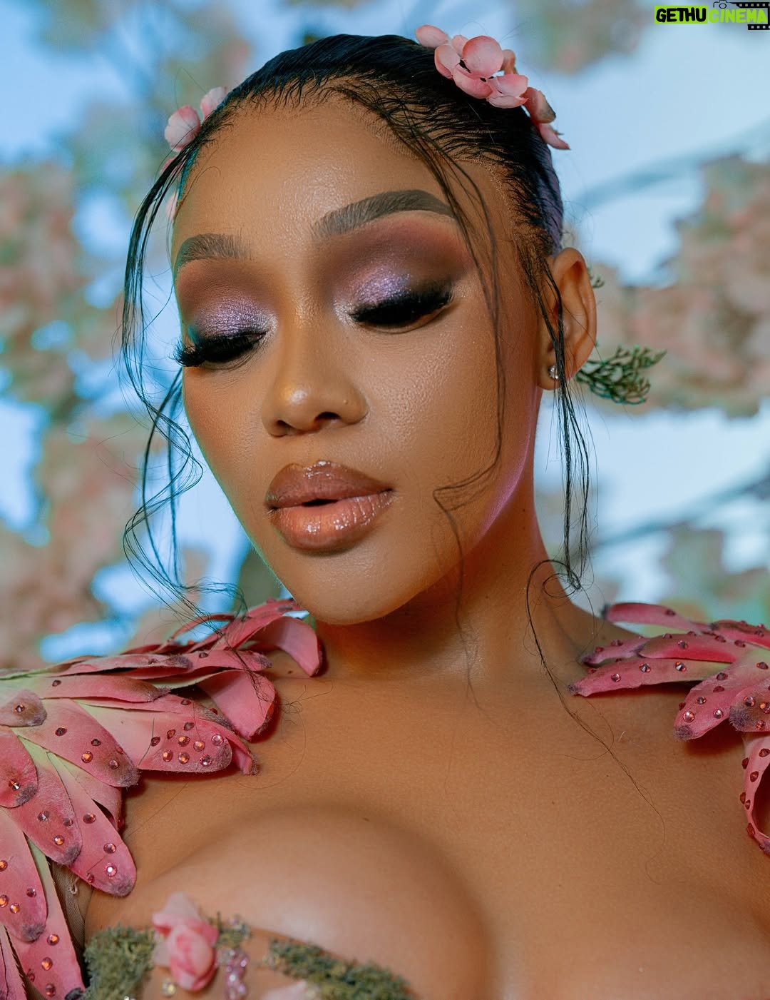 Thando Thabethe - 105.9K Likes - A love letter to South Africa’s soul — where valleys cradle winding rivers, mountains rise in quiet majesty, and the sky bursts into purple and orange at sunset. Inspired by the rich textures of indigenous flora and the rhythm of the land itself, every detail reflects the beauty and grace of a country where nature speaks in color and movement.🌸🌸🌸
#marvelsofmzansi
#durbanjuly2025 
#HDJ2025 #hdjmarvelsofmzansi #feelthepulse 

Glam: @thepenthousebeautystudio 
Photography: @aust_malema 
Dress: @willetdesignscouture