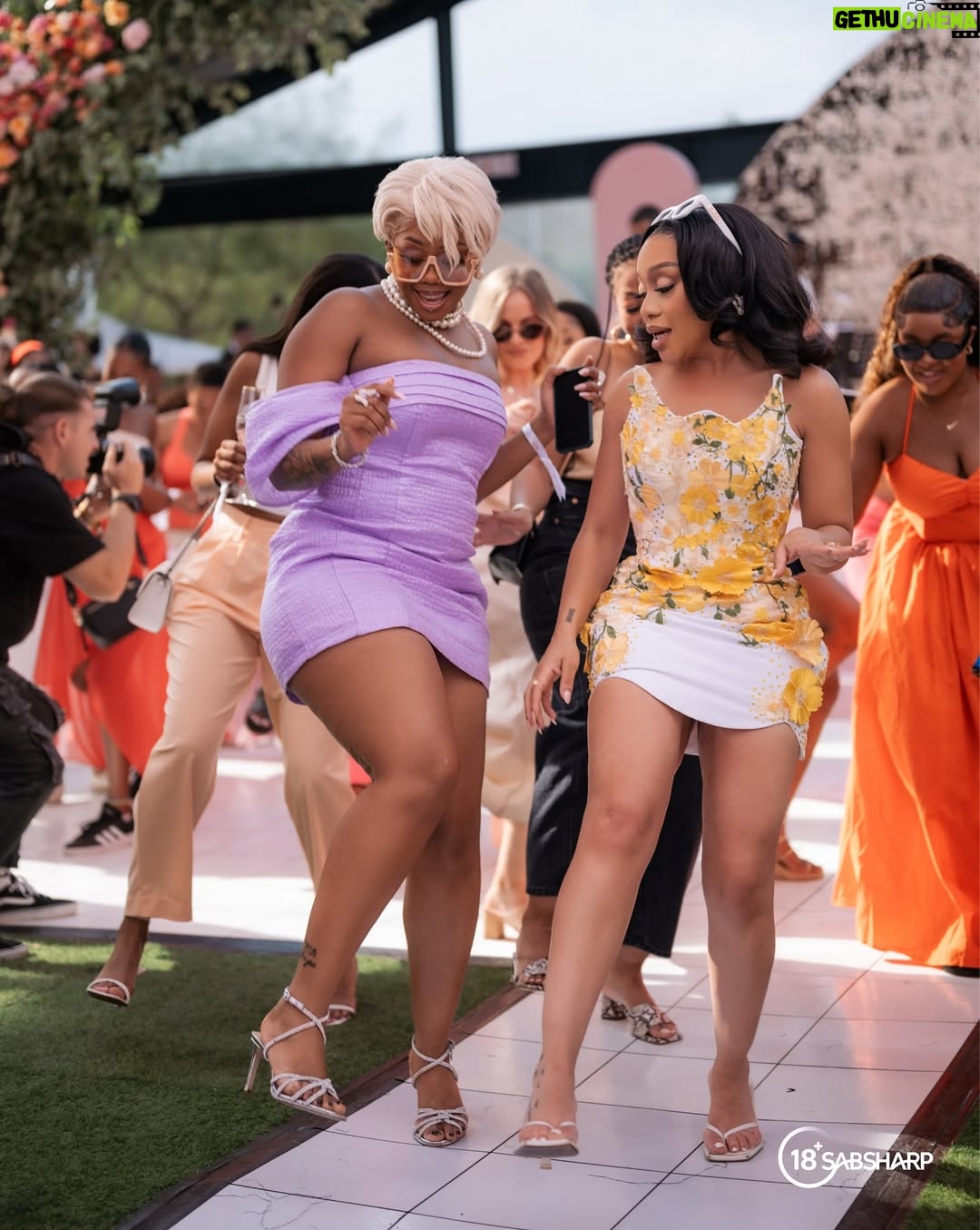 Thando Thabethe - 83.7K Likes - A beautiful ladies day out with @brutalfruitza 🌸🌸🌸🌼🌼🌼
#spritzersaturdaybrunch 

Obsessed with this dress @scalodesigner 🥹🥰
Glam by @thepenthousebeautystudio 😍😍