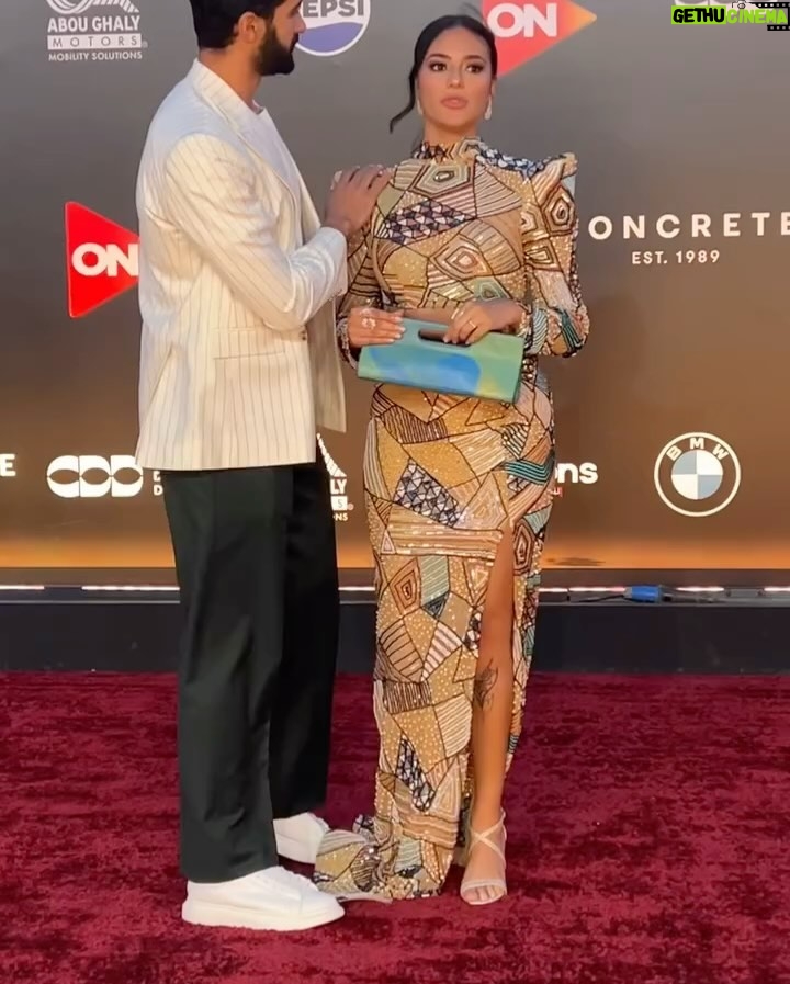 Tharaa Goubail - 15.1K Likes - Capturing the essence of elegance on the red carpet ✨
@tharaa.goubail from “Who Do I Belong To” at @elgounafilmfestivalofficial 7th edition 💫

Stylist: @passantzahra 
Designer: @samo_hagras 
Jewelry: @bijoux.jewelry.eg 
Clutch: @moski.clutches