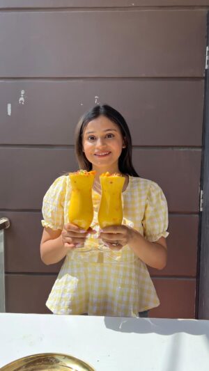 Vaidika laddha Instagram - Mango Mastani 💗😋
~ Mango
•Cut them into pieces.
For icecream:
~ 2 cup Fresh cream
~ 1/2 cup condense milk
~ mango cubes
•Grind it into fine paste & pour it into airtight container & garnish it with tutti frutti & mango cubes. & freeze it for 6-7 hours.
~ Mango
~ milk
~ sugar
~ condense milk
• grind it well & arrange in a glass as shown in the video.
•Garnish it with a tutti frutti , mango cubes & dry fruits.
Follow @eatandeatttttt for more such easy recipes.