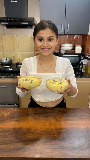 Vaidika laddha Instagram - Fruit Custard 💗😋
~ 1.5 litres Milk
~ 3 tbsp sugar
• Boil it for 10 -12 minutes.
~ 2 tbsp custard powder
~ water
• mix them well.
~ 1 tbsp milk powder
• Now add custard mixture to the milk & mix it well until it thickens without lumps.
• Let the custard cools down for 1-2 hours.
~ Mango
~ Green grapes
~ Black grapes
~ Red grapes
~ Apple
~ Banana
~ Kiwi
~ pomegranate
• Chop all the fruits as shown in the video.
• Now add chilled custard milk into the fruits & mix it well.
• Serve it chilled & enjoyyyy.
Follow @eatandeatttttt for more such easy recipes.