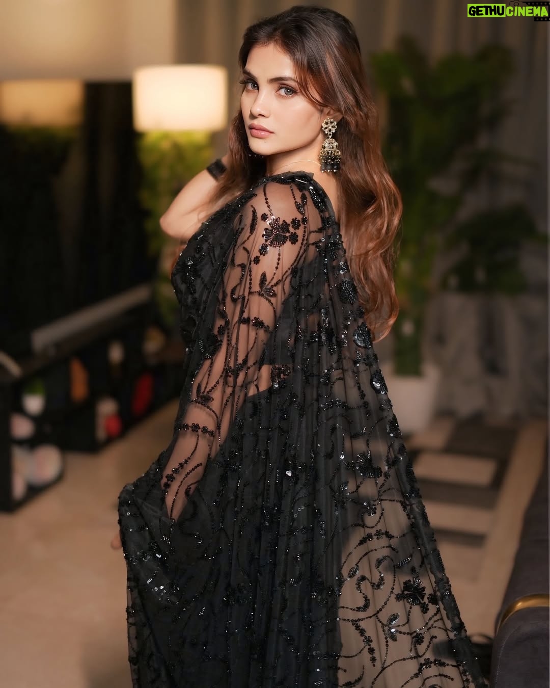 Zoya Jaan - 399.9K Likes - In the world of colors, 
I found my elegance in black.” 🖤 

#zjn #blacksaree #saree