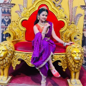 Aaradhya Chandra Instagram - Playing role of Goddess Chamundeshwari in Sri Devi Mahatme on @starsuvarna . Purple saree on a golden throne is the embodiment of feminine strength and elegance.
#strength #goddess #beauty #vibes #starsuvarana #serial