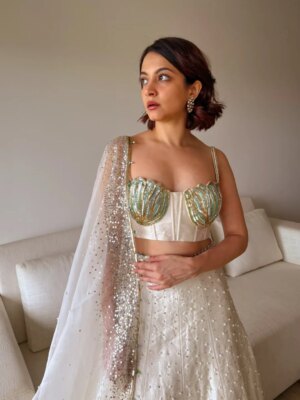 Anandita Pagnis Instagram - Step into our whimsical world of hand-painted giraffes, zebras, and banana trees, amidst buzzing fireflies and majestic cockatoos. Our Golden Earth Hand-painted Lehenga Set brings the Jungle Book to life on rich raw silk, with metallic gold tones and intricate embroidery that shines like the night sky. Every detail is a brushstroke of magic, every thread a whisper of wonder 🦓🌴🦒🌿🏝️🪺🔱

[World of Anush, Bespoke, Lehenga Set, Corset, Floral, Hand embroidery, Hand Painting] 

#worldofanush #bespoke #lehenga #corset #instagram #fyp