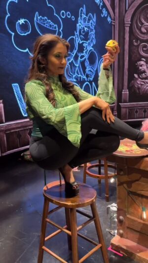 Anjali Bhimani Instagram - Just casually prepping to be the Critmaster at @twentysidedtavern . Ms. Mischief at your service.👠😈⚔️

Wanna come see me do the show as Mischief Ginger Rogers style - backwards in high heels? Two more chances to make that happen today at 1 pm and 6 pm at the Broadway Playhouse before I move on and the queen @quiddie comes in as Magic on Tuesday! Tickets on sale at www.thetwentysidedtavern.com! 

(And then come see me Monday at the Lincoln Lodge when I DM an actual play one-shot of my adventure The Malady of Minarrh! Tickets at link in bio.)

(🎥: @mad.mad.murphy )

#nickiminajchallenge #twentysidedtavern #anjalibhimani #d20