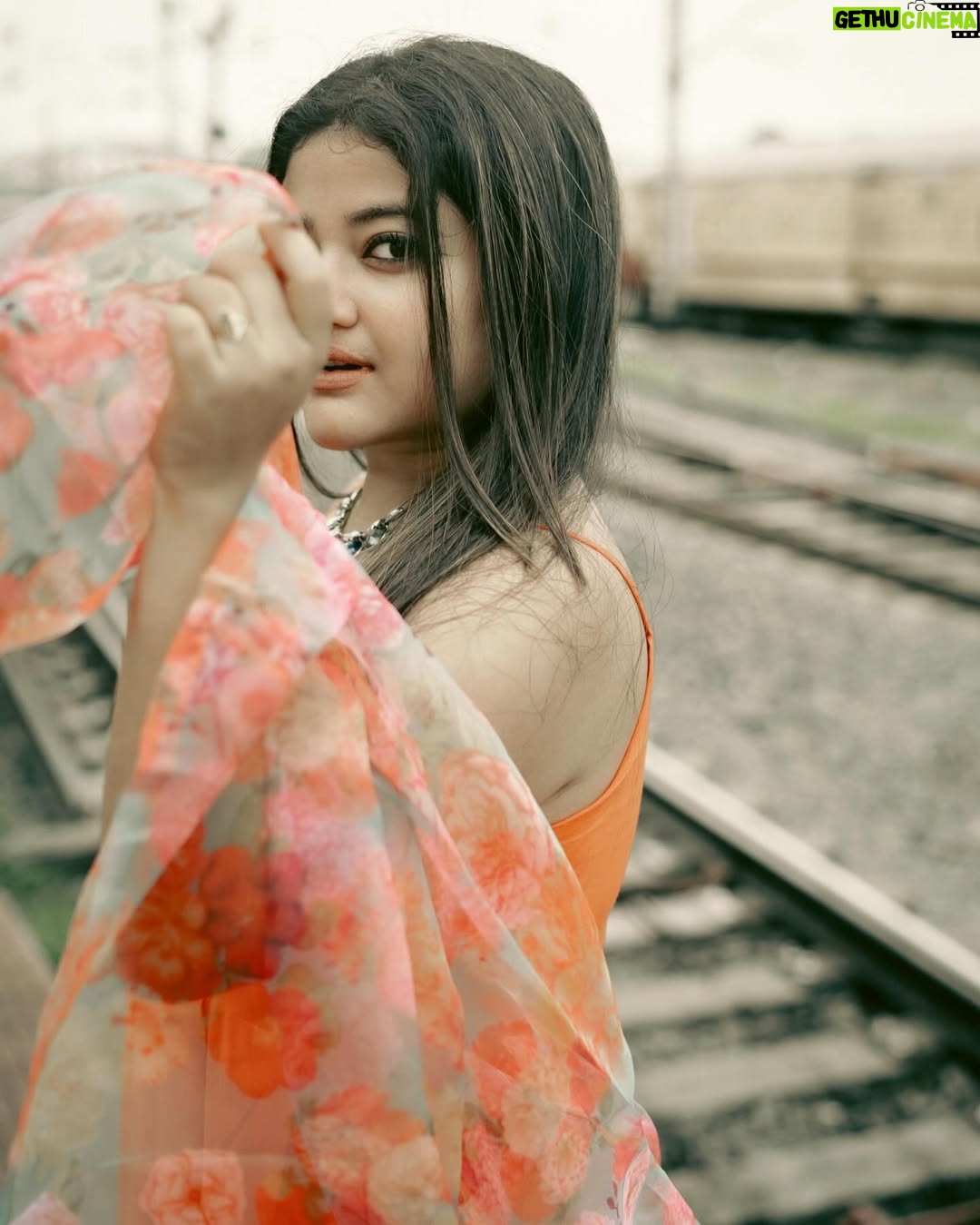 Asmee Ghosh - 12.3K Likes - In a world that never stops moving, I chose to pause to lean into my own rhythm, to stand boldly where stories pass and silence speaks louder than noise. Draped in hues, wrapped in grace, I’m not waiting for a train, a sign, or permission! just owning the tracks I walk and the fire I carry. I don’t blend in with the blur, I break it. While the world rushes past, I stand still, sharp, and unbothered. Against cracked walls and iron rails, I wear my fire loud and my silence louder. This isn’t softness, it’s strength wrapped in calm. I’m not here to be delicate. I’m here to be unforgettable. Watch the train pass. I’ll still be standing. Rooted to the earth. Miles to go before I sleep….

Behind the lens @swaratghosh 🧡