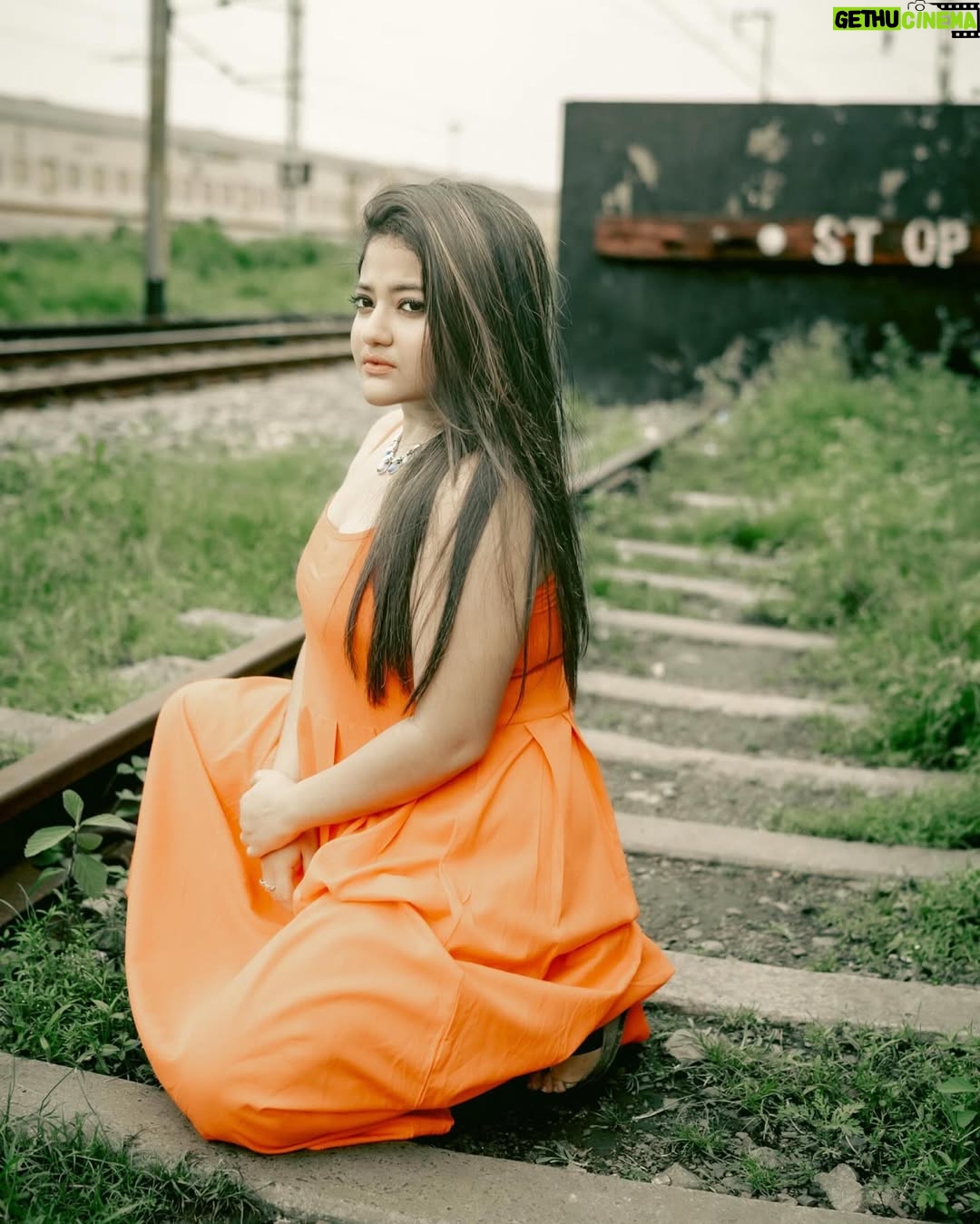 Asmee Ghosh - 12.3K Likes - In a world that never stops moving, I chose to pause to lean into my own rhythm, to stand boldly where stories pass and silence speaks louder than noise. Draped in hues, wrapped in grace, I’m not waiting for a train, a sign, or permission! just owning the tracks I walk and the fire I carry. I don’t blend in with the blur, I break it. While the world rushes past, I stand still, sharp, and unbothered. Against cracked walls and iron rails, I wear my fire loud and my silence louder. This isn’t softness, it’s strength wrapped in calm. I’m not here to be delicate. I’m here to be unforgettable. Watch the train pass. I’ll still be standing. Rooted to the earth. Miles to go before I sleep….

Behind the lens @swaratghosh 🧡
