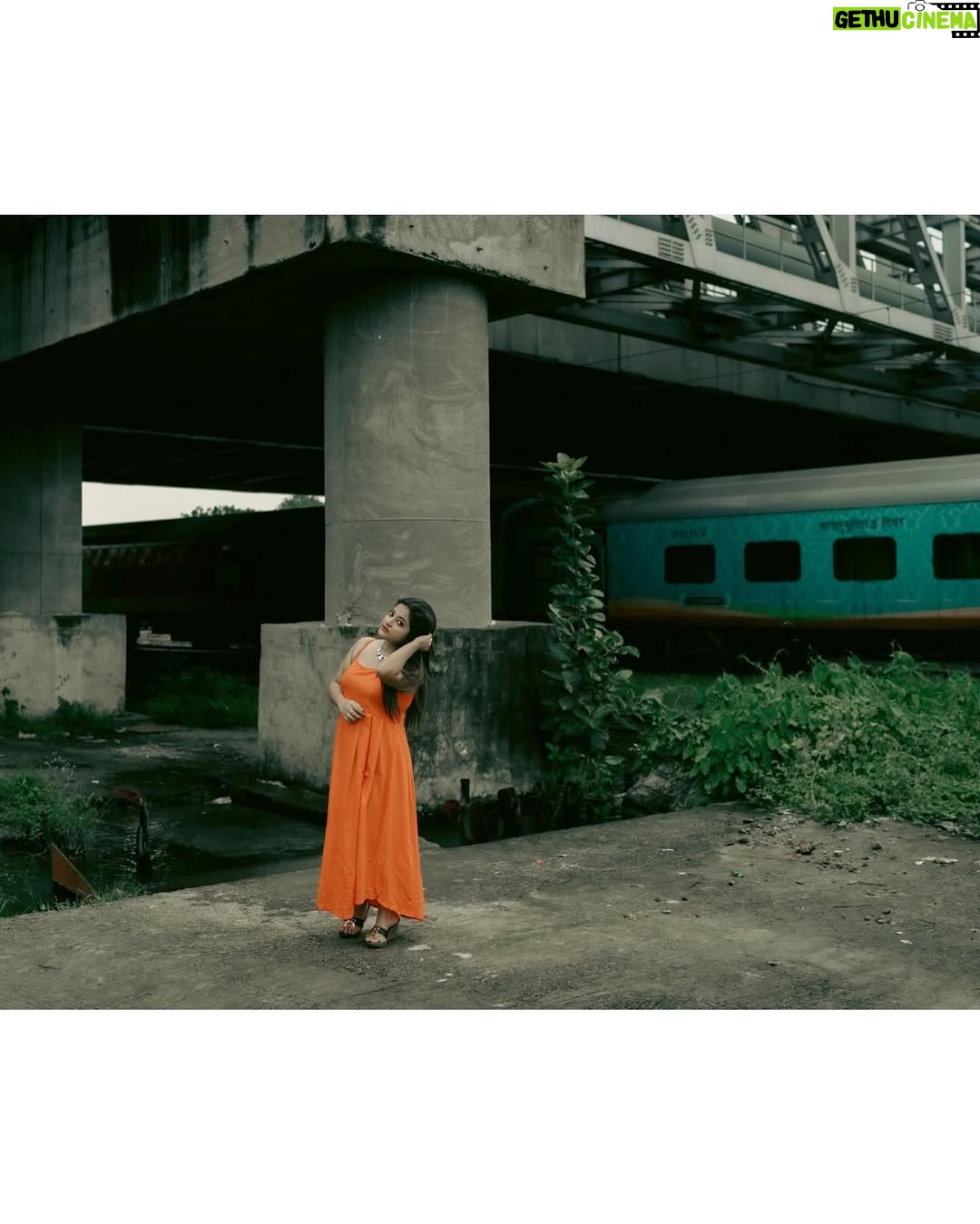Asmee Ghosh - 12.3K Likes - In a world that never stops moving, I chose to pause to lean into my own rhythm, to stand boldly where stories pass and silence speaks louder than noise. Draped in hues, wrapped in grace, I’m not waiting for a train, a sign, or permission! just owning the tracks I walk and the fire I carry. I don’t blend in with the blur, I break it. While the world rushes past, I stand still, sharp, and unbothered. Against cracked walls and iron rails, I wear my fire loud and my silence louder. This isn’t softness, it’s strength wrapped in calm. I’m not here to be delicate. I’m here to be unforgettable. Watch the train pass. I’ll still be standing. Rooted to the earth. Miles to go before I sleep….

Behind the lens @swaratghosh 🧡