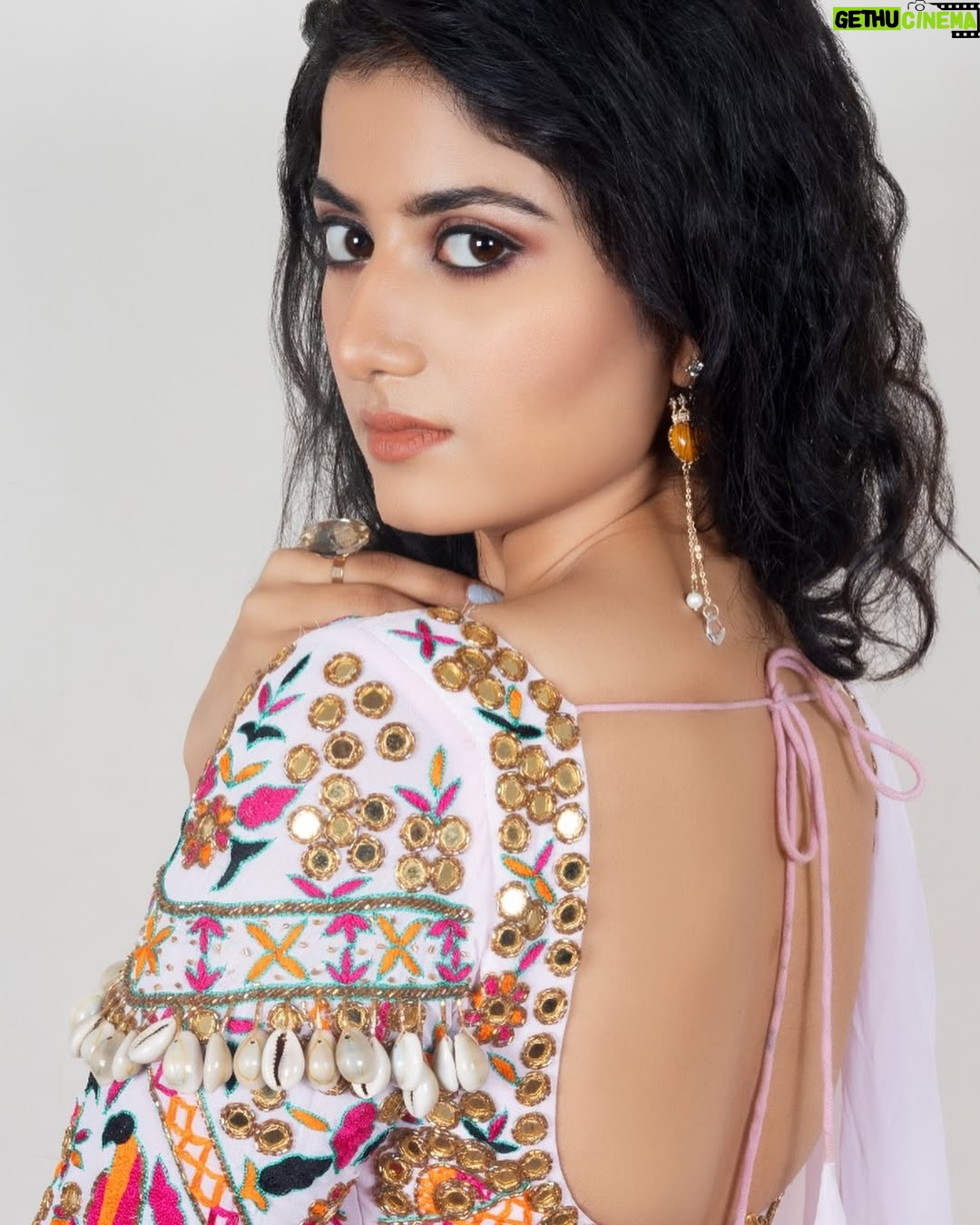 Astha Khandelwal - 2.5K Likes - In the quiet grace of her gaze, a thousand suns rise, 
Her smile, a delicate dance of moonlight on serene waters, 
Wrapped in hues of the earth, she walks like dawn, 
A whisper of tradition, a breath of the ancient, 
Yet in her eyes, the spark of youth, untamed and free, 
She is a song of the land, a portrait of timeless beauty, 
Where past and present entwine in her every step, 
A living poem, an eternal dream, she is India’s own.
 

[ Grace, Elegance, Tradition, Youth, Dawn, Ancient, Timeless, Poem, Beauty, Culture, Heritage, India, Radiance, Serenity ]